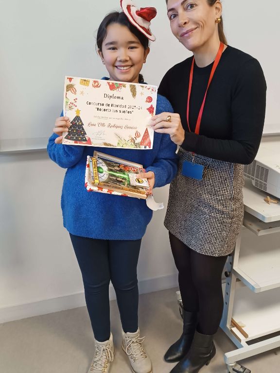 Luna, del Lycée, con su profesora